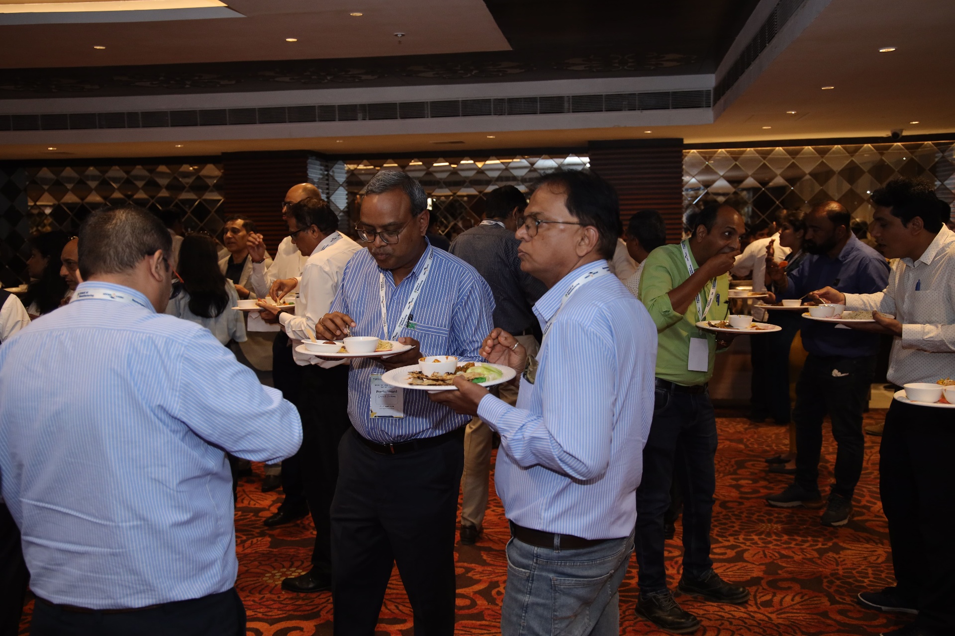 Business owners exchanging ideas at an industry gathering